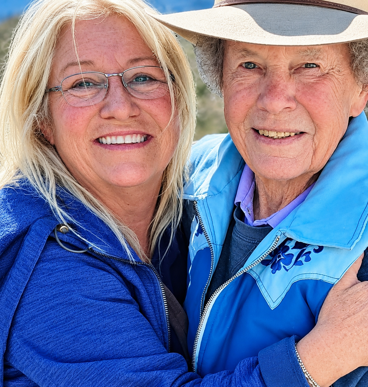 Julie with her mother, both smiling